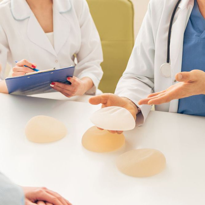 People discussing breast implant